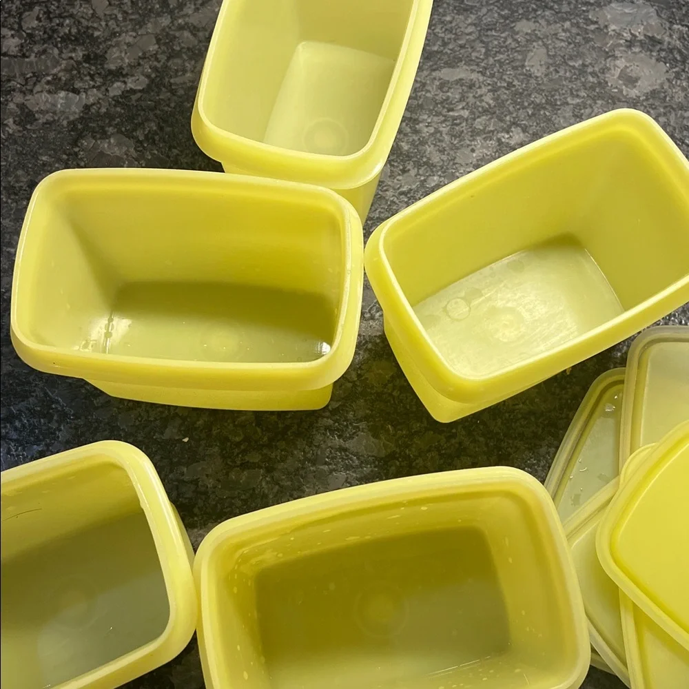 5 piece set of yellow storage containers by Tupperware. Vintage pieces e…